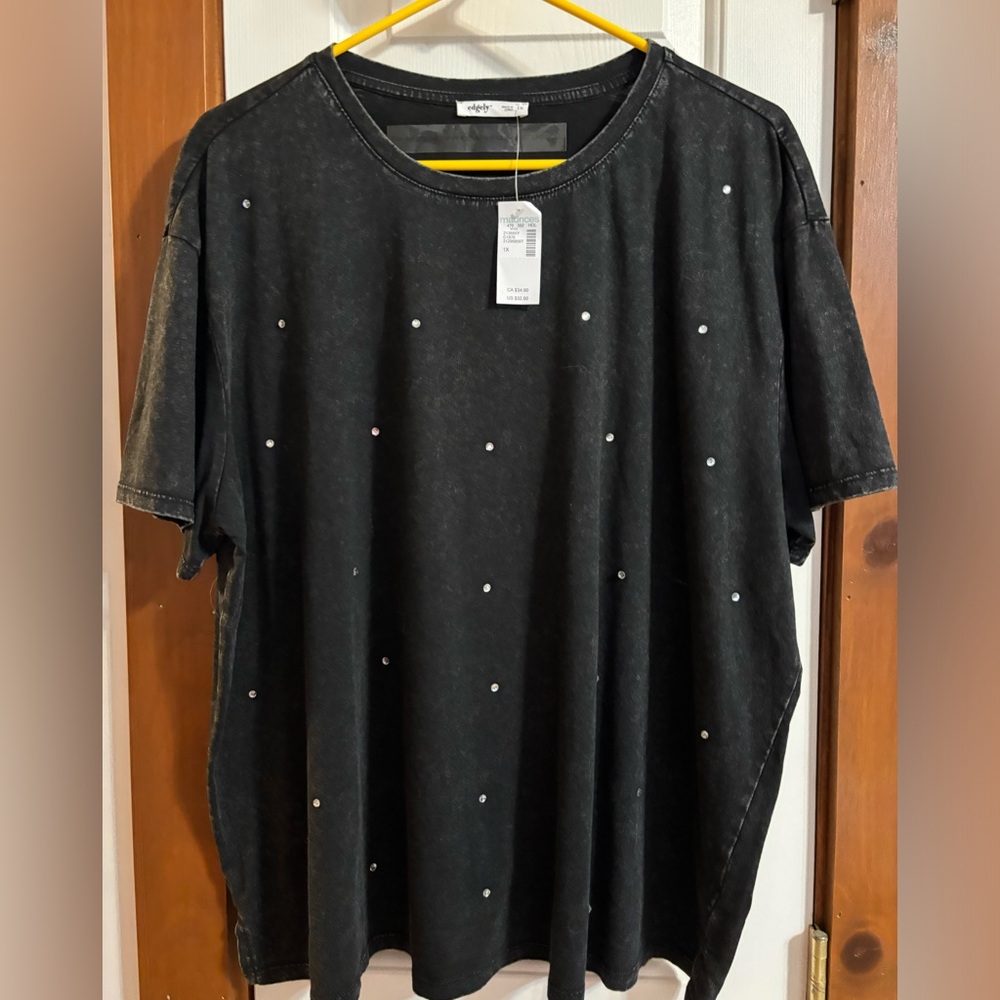 Maurice’s nice black shirt with diamonds studs.  Beautiful elevated Tshirt